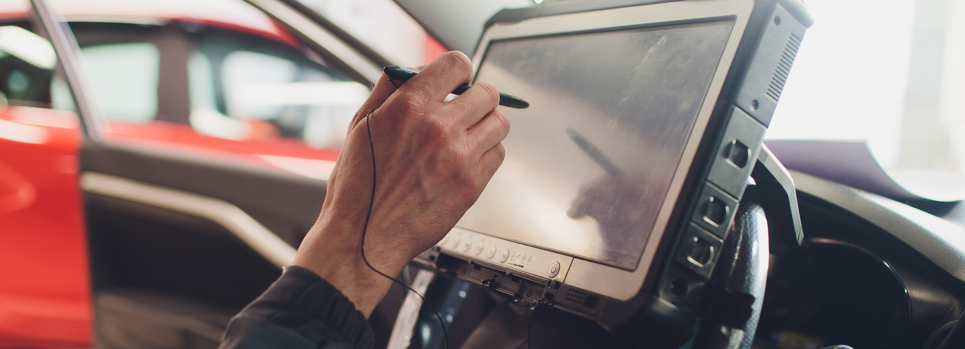 Mechanic analysing a vehicle - Car Diagnostics Bethnal Green