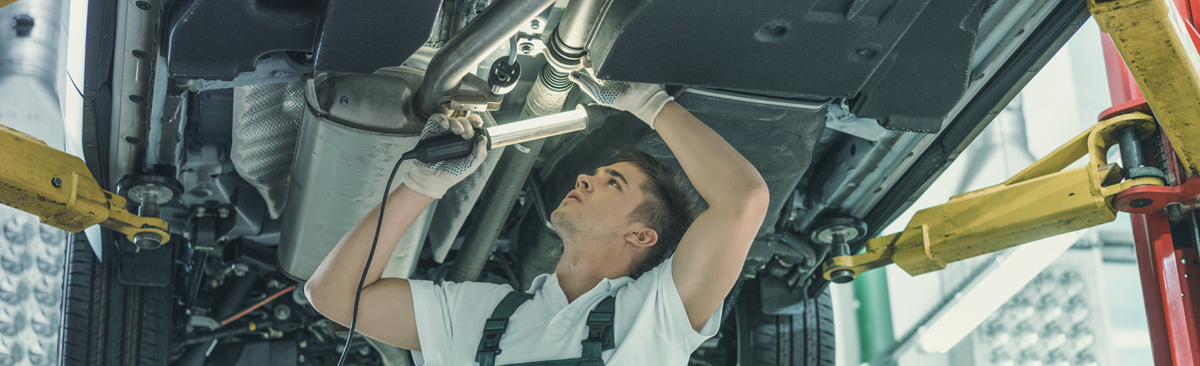 Mechanic doing an MOT inspection - MOT Bethnal